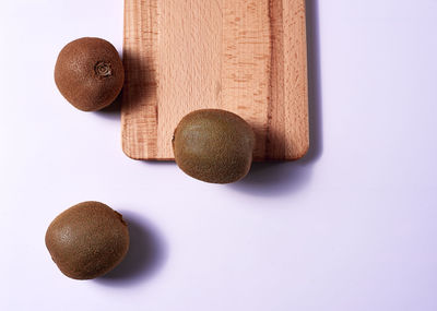 High angle view of eggs on table against white background