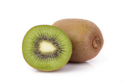 Close-up of oranges against white background