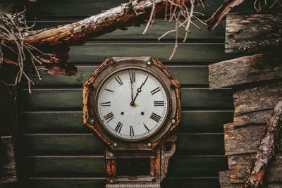 Close-up of clock on wall