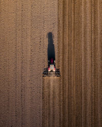 Directly above tractor on agricultural field