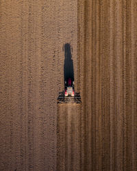 Directly above tractor on agricultural field