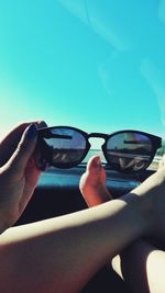 View of a car against clear blue sky