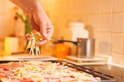 Close-up of person preparing food