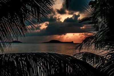 Scenic view of sea against sky at sunset