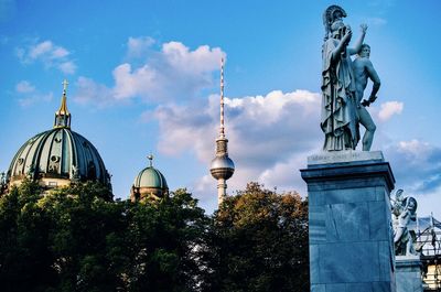 Low angle view of statue against sky