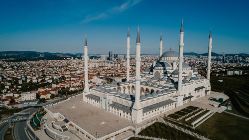 High angle view of buildings in city against sky