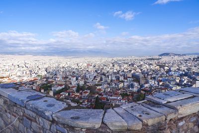 High angle view of townscape against cloudy sky