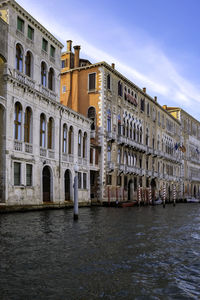 Beautiful palace in grand canal on a bright cleer day - quiet morning in venice, veneto, italy