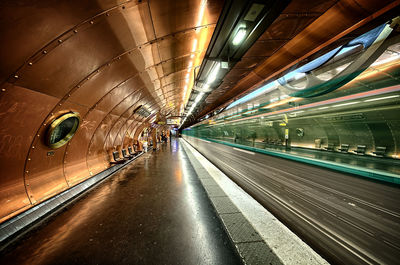 Blurred motion of train at subway station