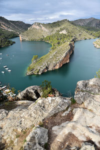 High angle view of lake amidst rocks