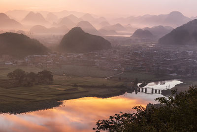 Scenic view of mountains against sky during sunset