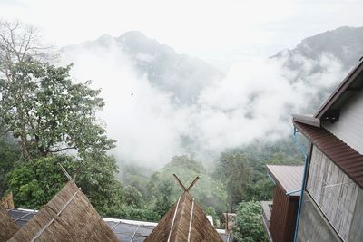 Panoramic shot of roof and houses against sky