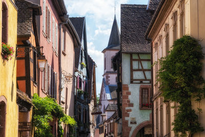 Riquewihr historical town timbered houses along the narrow cobble stoned street. taken in riquewihr,