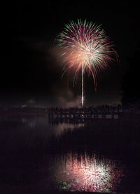 Fireworks over sugden regional park in naples, florida on independence day.