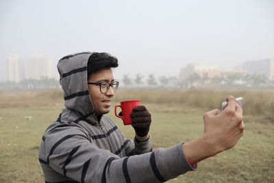 Young man drinking coffee