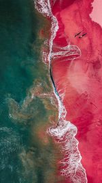 High angle view of water flowing through rocks