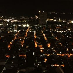 Illuminated cityscape at night