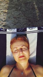 Portrait of young man lying down