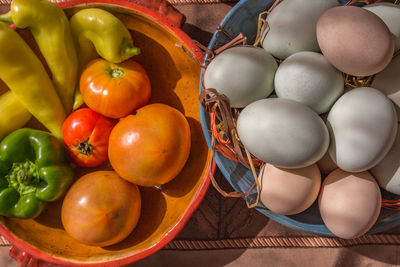 High angle view of fruits in basket on table