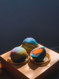 High angle view of cake on table against black background