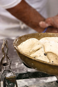 Close-up of hand holding bread