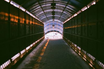 Illuminated bridge at night