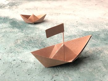 High angle view of paper boat