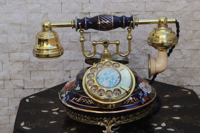 Close-up of electric lamp on table