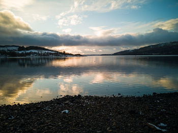 Scenic view of sea against sky during sunset