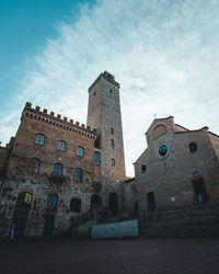 Low angle view of old building against sky