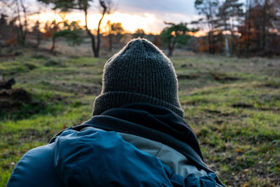 Rear view of man on snowy field