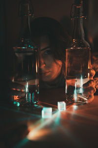 Portrait of mid adult man in glass