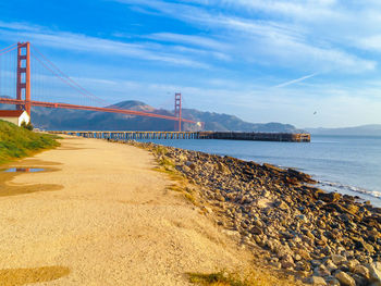 View of suspension bridge at beach