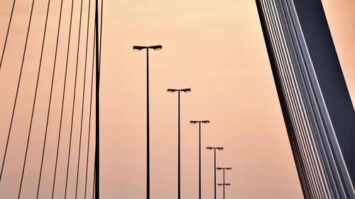 Low angle view of street light against sky