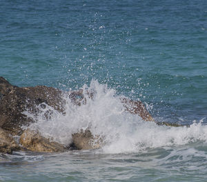 Sea waves splashing on shore