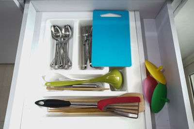 High angle view of kitchen utensils on table