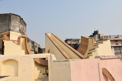 Low angle view of old building against clear sky