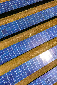 Upright image of a ground mounted photovoltaic system as aerial view