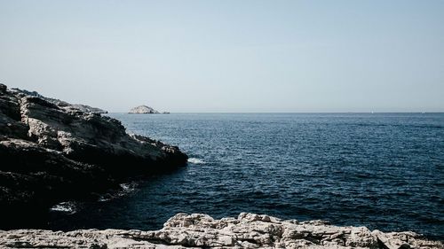 Scenic view of sea against clear sky