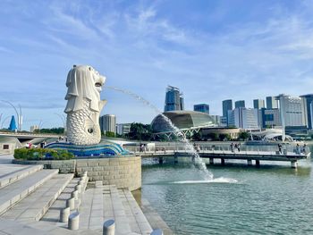 Low angle view of fountain against sky