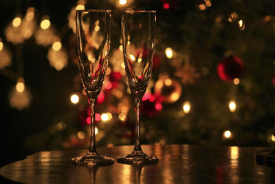 Close-up of illuminated christmas lights on table