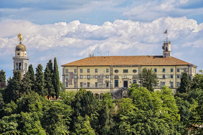 View of historical building against cloudy sky