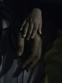 Close-up of woman hand with shadow