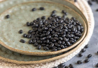 Close-up of coffee beans on table