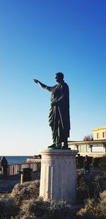 Statue of liberty against clear blue sky