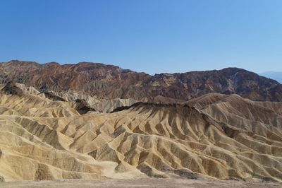 Scenic view of rocky mountains against sky, zabriskie point, death valley