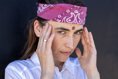 Close-up of woman using mobile phone