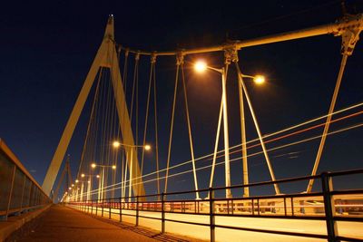 View of suspension bridge at night