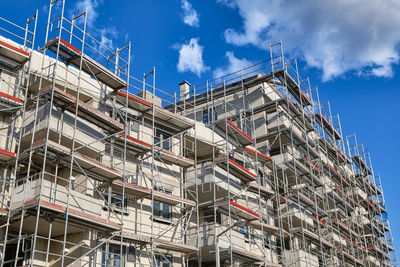 Low angle view of building against blue sky