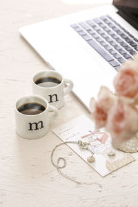 High angle view of coffee cup on table